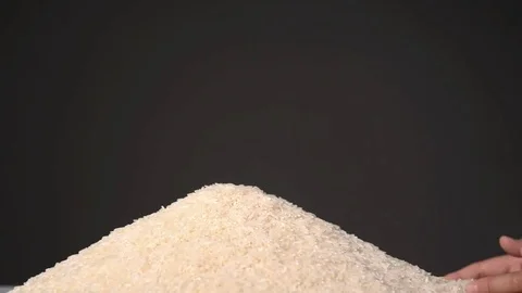 Slow motion of rice fall from little kid hands Stock Footage 85382251
