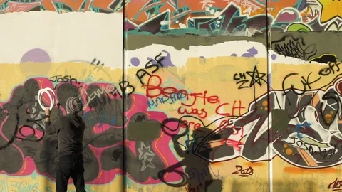 Slow-motion Ring throwing against street art Video stock 101283235