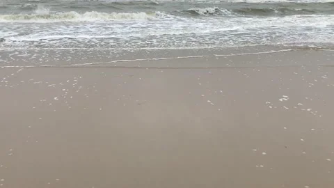 Slow motion ripple ocean waves, cloudy sky, rainy day. Stock Footage 155629598