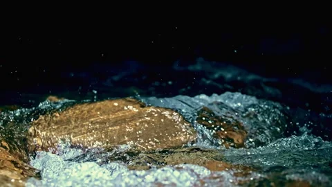 Slow motion ripple waves on dark blue water river.Dramatic night background Stock Footage 327535691