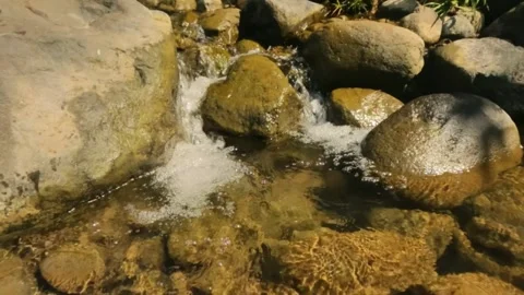 Slow motion of a river cascade with clear water Stock Footage 321860075