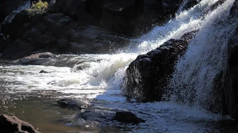 Slow-motion river waterfall Stock Footage 137144488