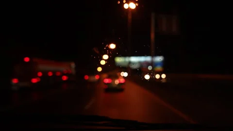 Slow motion on road of night and bokeh light  Video stock 249060486