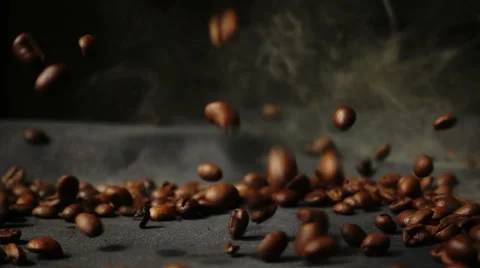 Slow Motion roasted coffee beans to scatter 動画素材 68633696