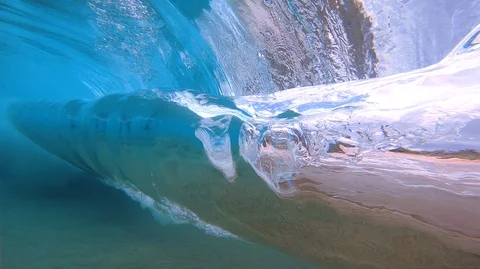 Slow Motion Rock Rolling On Ocean Bottom And Wave Breaking Stock-Footage 120666953