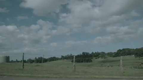 Slow Motion Rolling Clouds Above Green Fields in Sunshine Coast Hinterland, Aust Stock Footage 341298299