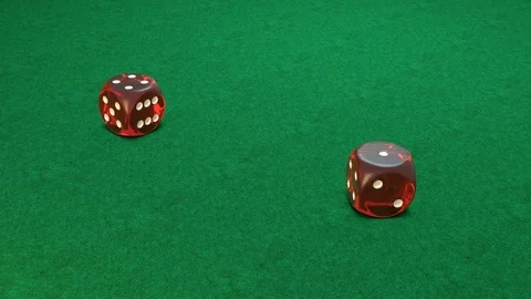 Slow motion of rolling red dice on green background Stock Footage 75653839