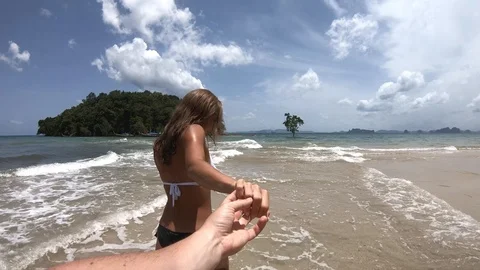 SLOW MOTION. Romantic scene of young love couple at Similan islands in Andaman Stock Footage 94384903