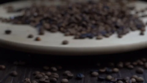 Slow motion rotating roasted coffee beans Video stock 116291450