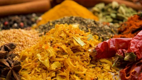 Slow motion rotating view of beautiful vibrant colourful spices  Stock Footage 127993889