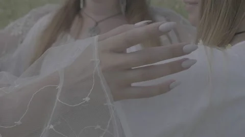 Slow motion round dance closeup of hands on shoulders. Slavic female folk dance Stock Footage 229930134