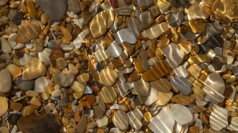 Slow motion of round waves from corner of frame on shallow pure water. Video stock 98094655