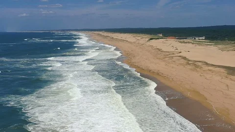 Slow-motion rugged ocean beach aerial view Stock Footage 112709187