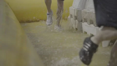 Slow motion running through water 스톡 동영상 147513449