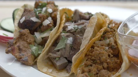 Slow Motion Salsa Drizzling on Tacos Stock-Footage 113661929