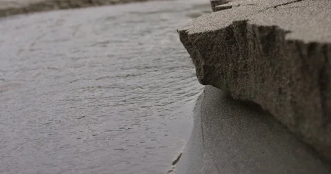 Slow Motion Sand Falling Into Water Video stock 71134229