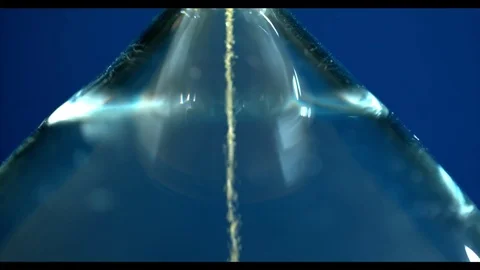 Slow motion sand timer flowing from through hour glass Stock Footage 83999789