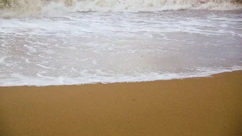 Slow motion sandy beach with rolling waves Stock Footage 82122042