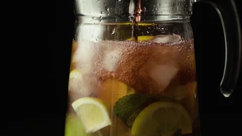 Slow motion sangria in the decanter Stock Footage 72698894