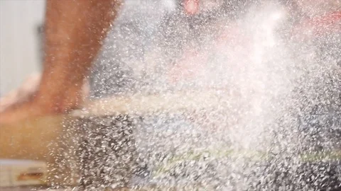 Slow Motion Saw Dust from the Back of Skill Saw Cutting 2x4 Stockbeeldmateriaal 104891216