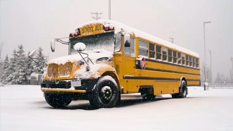 Slow Motion School Bus in the Snow Stock Footage