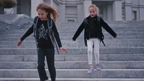 Slow motion of school kids getting down from staircase at school 4k. Stock Footage 161248856