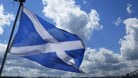 Slow motion of Scottish flag on sunny summer day - close up Stock Footage 92621063