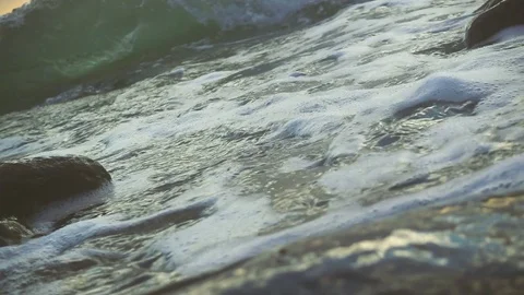 Slow motion sea foam from the waves on the shore Stock Footage 81352772