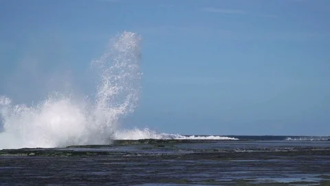 Slow motion sea wave hit rock at coast with big splash Stock Footage 86774254