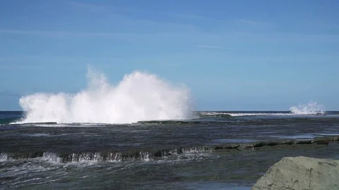Slow motion sea wave hit rock at coast with big splash Stock Footage 86774590