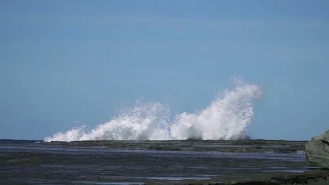 Slow motion sea wave hit rock at coast with big splash Stock Footage 86797858