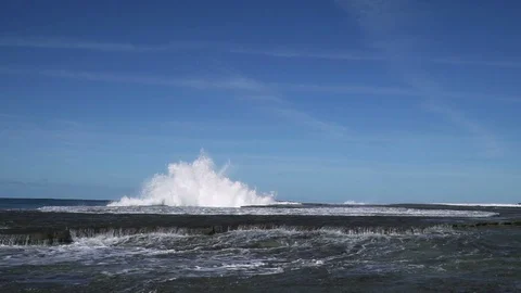 Slow motion sea wave hit rock at coast with big splash Stock Footage 86799723