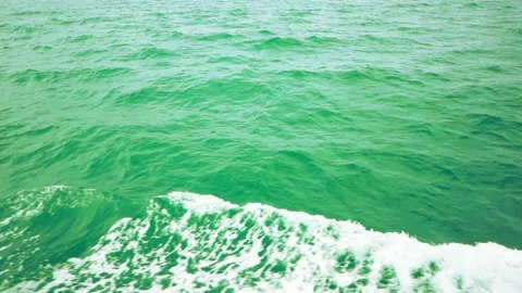 Slow motion sea wave splash by boat on daytime Stock Footage 137535238