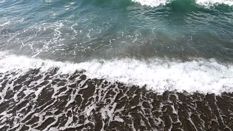 Slow motion of the sea waves on the beach Stock Footage 137588858