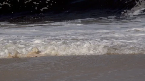 Slow motion of sea waves in close up. FRONT VIEW. Stock Footage 127156105