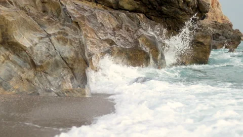 Slow motion sea waves hitting seashore 스톡 동영상 218827403