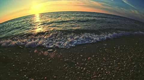 Slow motion. Sea waves near the shore on sunset or sunrise. Stock-Footage 51139201