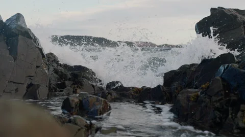 Slow Motion of Sea Waves Splashing on Rocks on the Coast, 4K Stock Footage 257682902