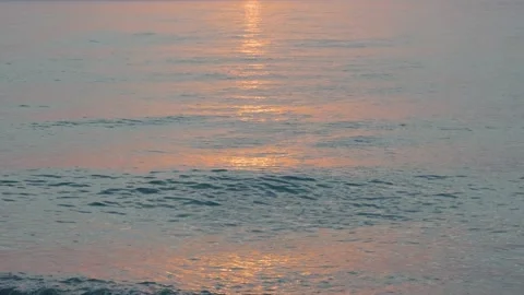 Slow motion of sea waves at sunset. Summer sunset seascape. Nature texture Stock Footage 242345672