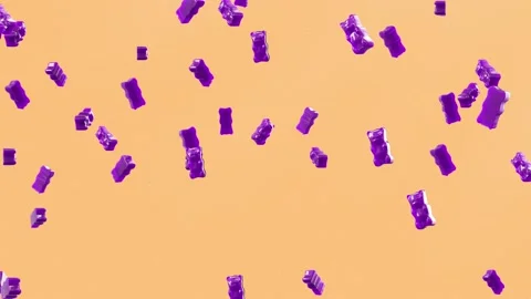 Slow Motion. Seamless Loop Background. Gummy bears candy. Purple jelly candy 스톡 동영상 197014374