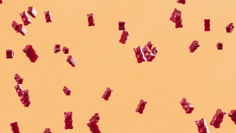 Slow Motion. Seamless Loop Background. Gummy bears candy. Red jelly candy bears  Stockbeeldmateriaal 197014635
