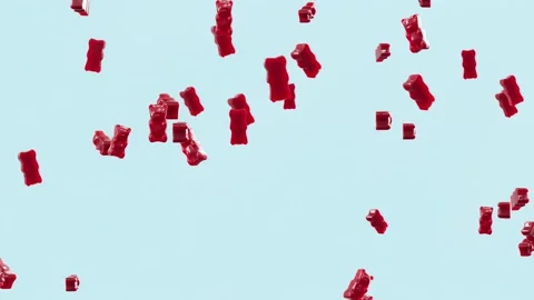 Slow Motion. Seamless Loop Background. Gummy bears candy. Red jelly candy bears  動画素材 197014637