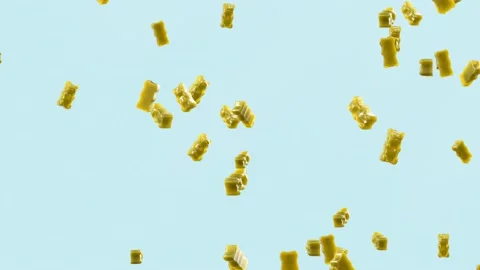 Slow Motion. Seamless Loop Background. Gummy bears candy. Yellow jelly candy  Video stock 197014644