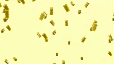 Slow Motion. Seamless Loop Background. Gummy bears candy. Yellow jelly candy  스톡 동영상 197015125