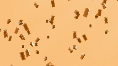 Slow Motion. Seamless Loop Background. Gummy bears candy. Orangejelly candy bear Stock Footage 197015499