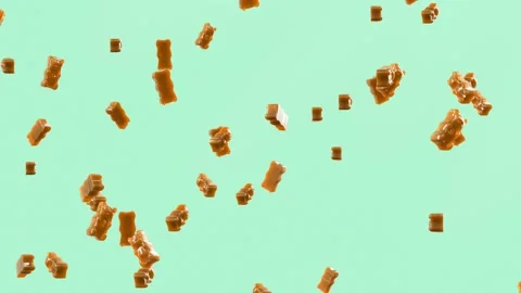 Slow Motion. Seamless Loop Background. Gummy bears candy. Orange jelly candy  Stock Footage 197015500