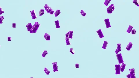 Slow Motion. Seamless Loop Background. Gummy bears candy. Purple jelly candy  Stock Footage 197015642