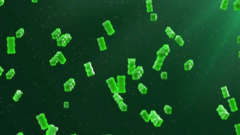 Slow Motion. Seamless Loop Background. Gummy bears candy. Green jelly candy bear Video stock 197016343