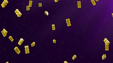Slow Motion. Seamless Loop Background. Gummy bears candy. Yellow jelly candy  Stock Footage 197016941