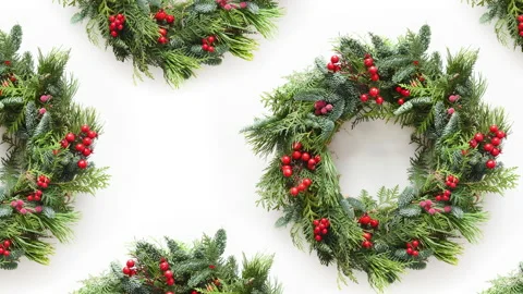 Slow motion of seamless pattern with natural Christmas wreaths. 4k video. Stock Footage 162977175